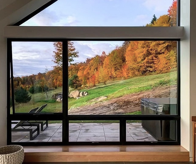 Interior image of a custom trapezoid Pella window created for Burlington home.