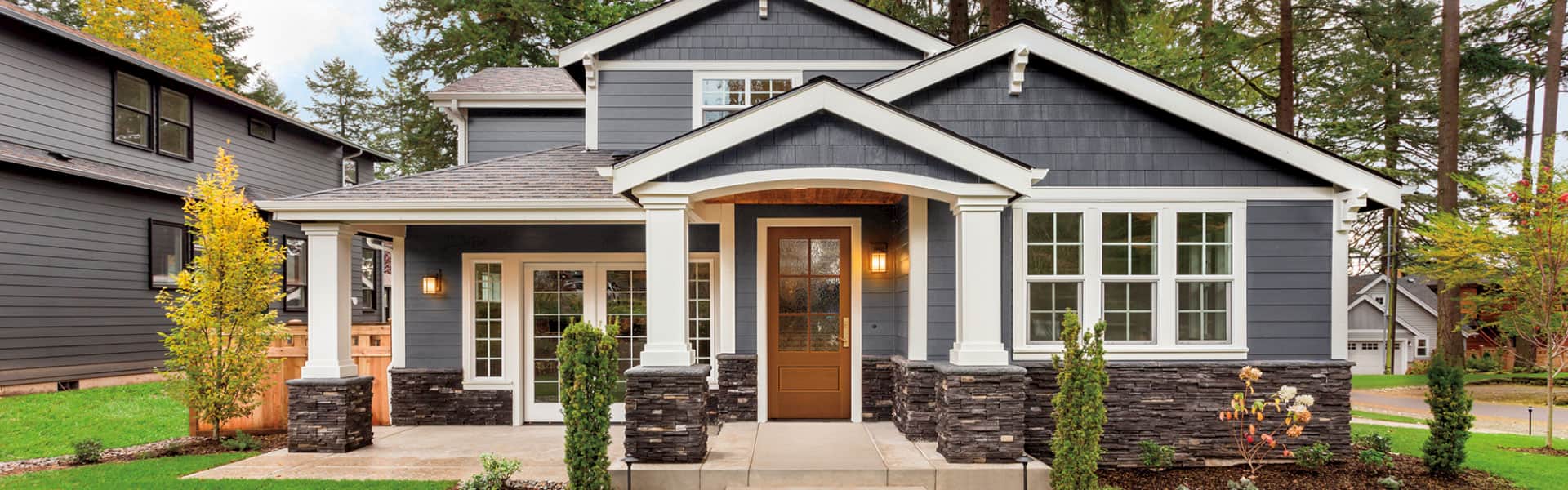 traditional home exterior with a new fiberglass half-light entry door