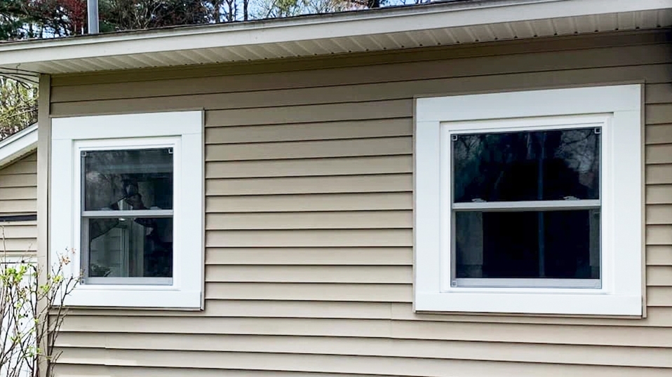 Newly installed Pella vinyl windows on Vermont home.