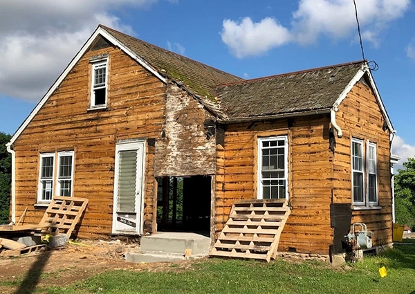 Before image of an older ranch-style home in Stewartstown in need of renovations.