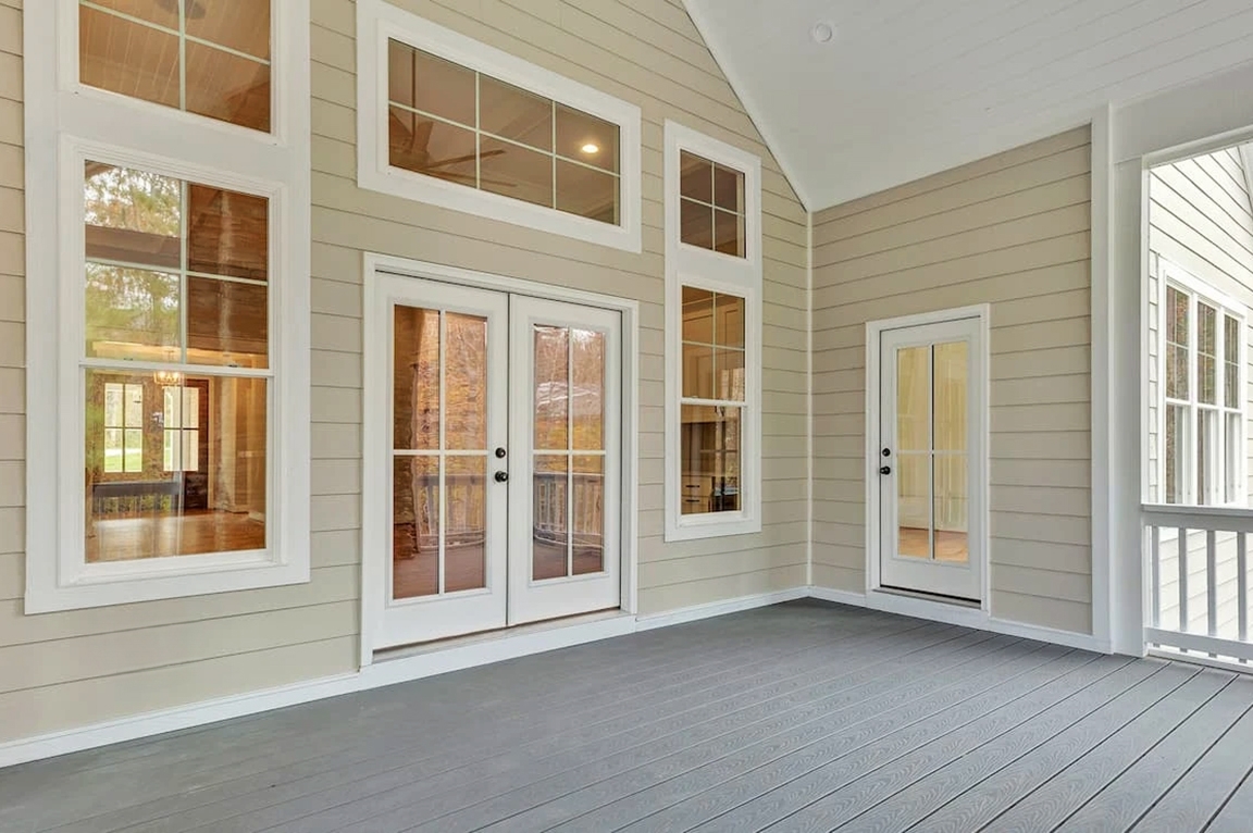 Richmond home patio highlighting white frame windows and doors.