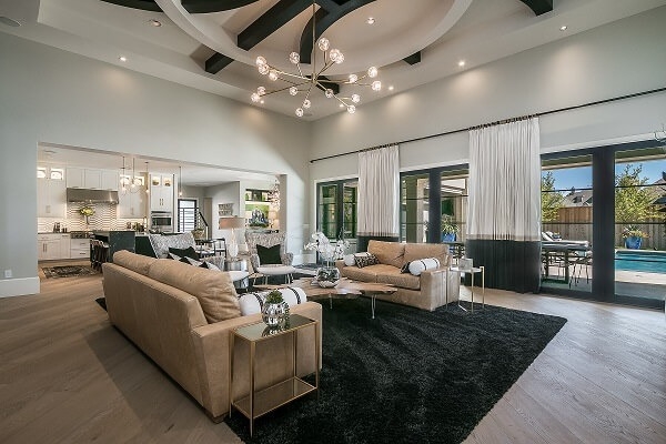 Living room in Amarillo home with newly installed Pella wood casement windows.