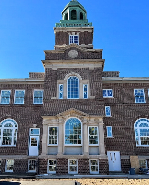 Front curbside view of St. Joseph's Place in Collingsdale with newly installed windows.