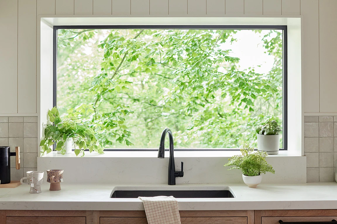 kitchen-window-with-plants.webp