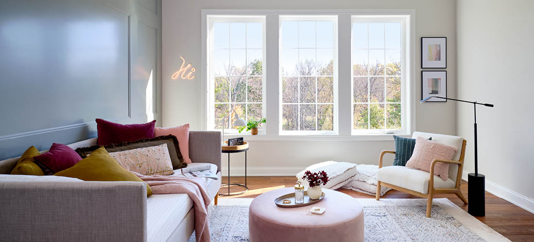 living room with three 250 series windows and the hidden screen on the outside casements