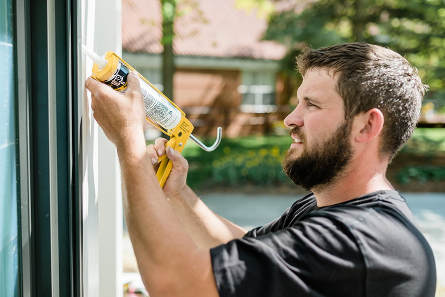 installing a new pella patio door by applying the sealant to the exterior