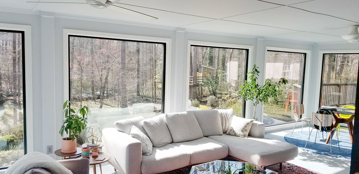Richmond sunroom with newly installed black windows.