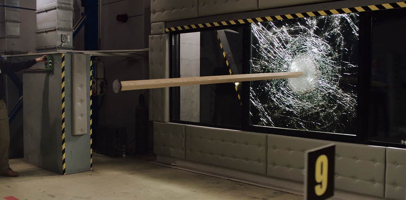 2x4 hitting an impact-resistant window in testing