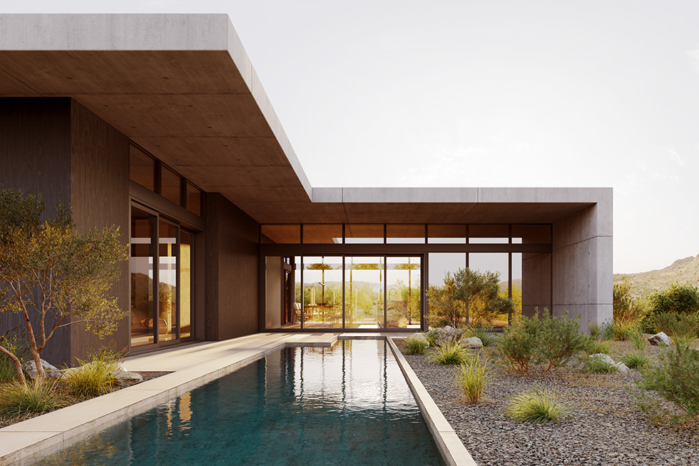 A modern contemporary home with a large stone overhang surrounds a small wading pool.