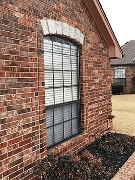 Black frame Pella window on Oklahoma City home. 