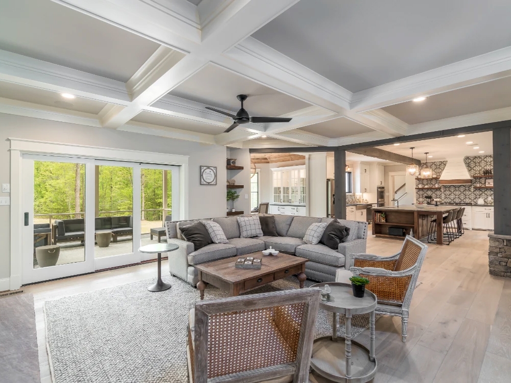 Richmond farmhouse living room interior highlighting multi-slide patio door.