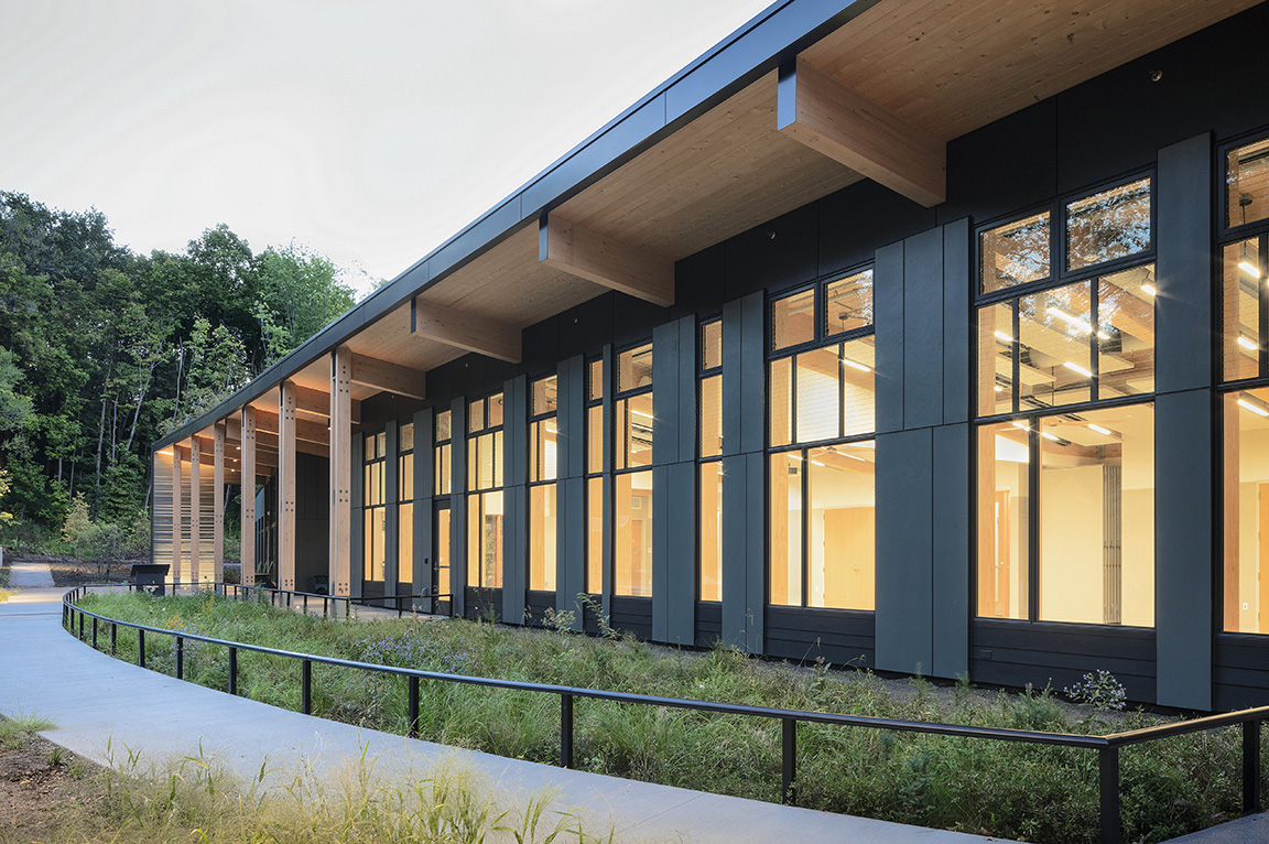 Exterior of St. Louis Park nature center showcasing newly installed black Pella windows. 