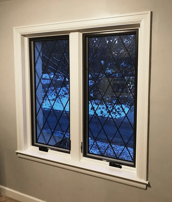 Side view of diamond grid windows in Columbus home.