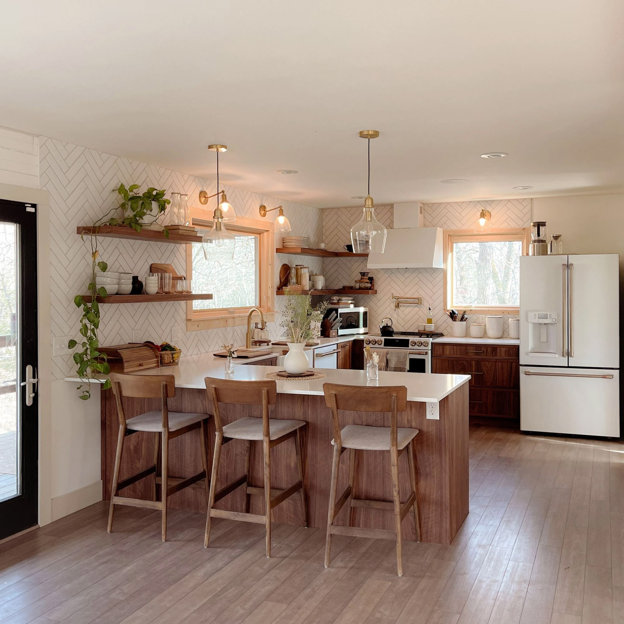 Fayetteville cabin kitchen with newly installed Pella windows.