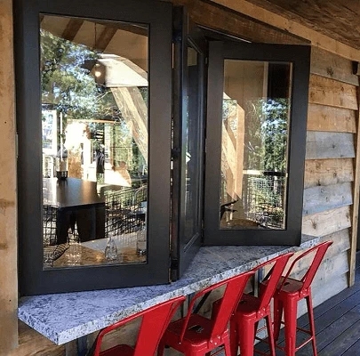 Kitchen pass through window on Truckee home patio.