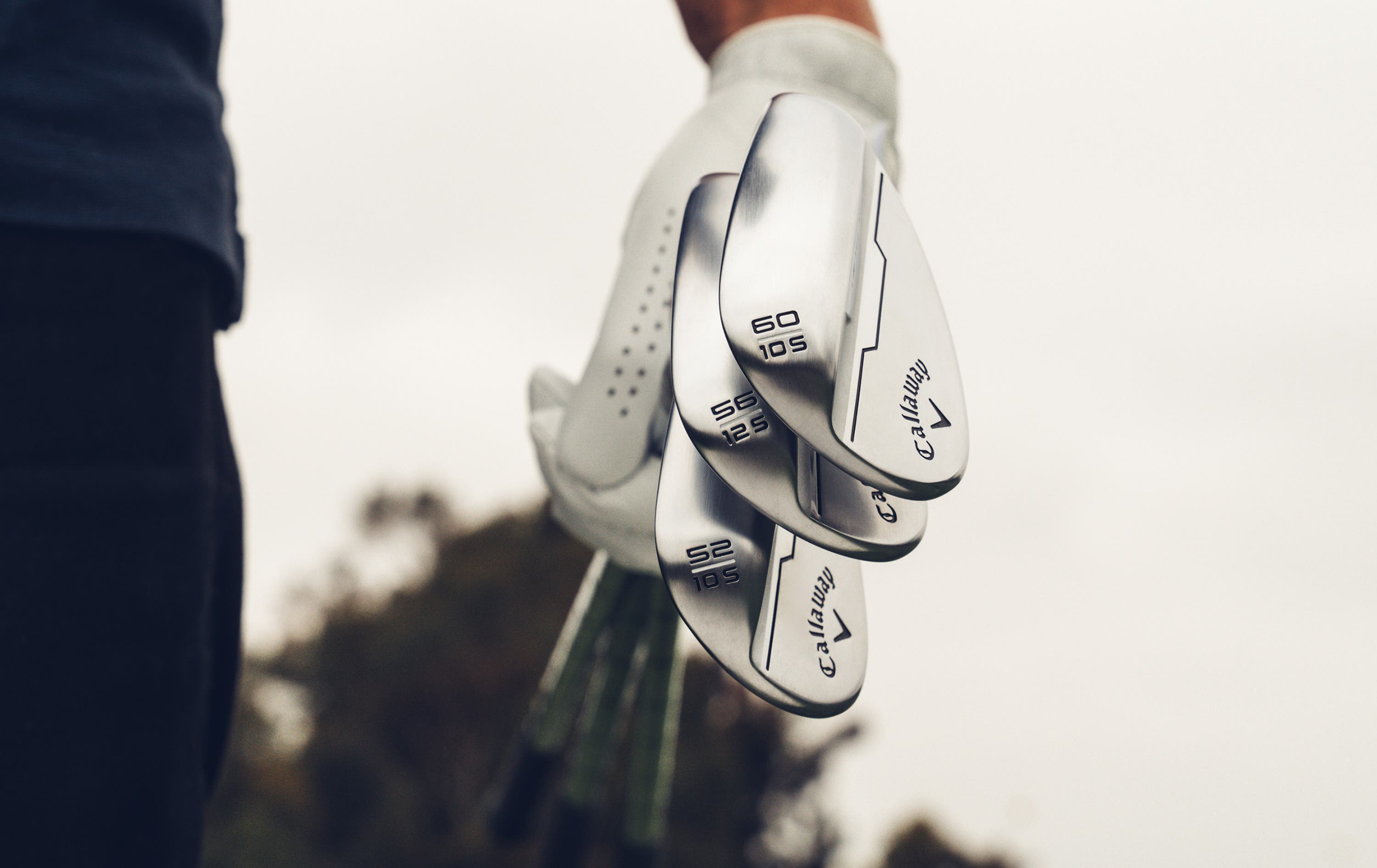 three opus wedges being held