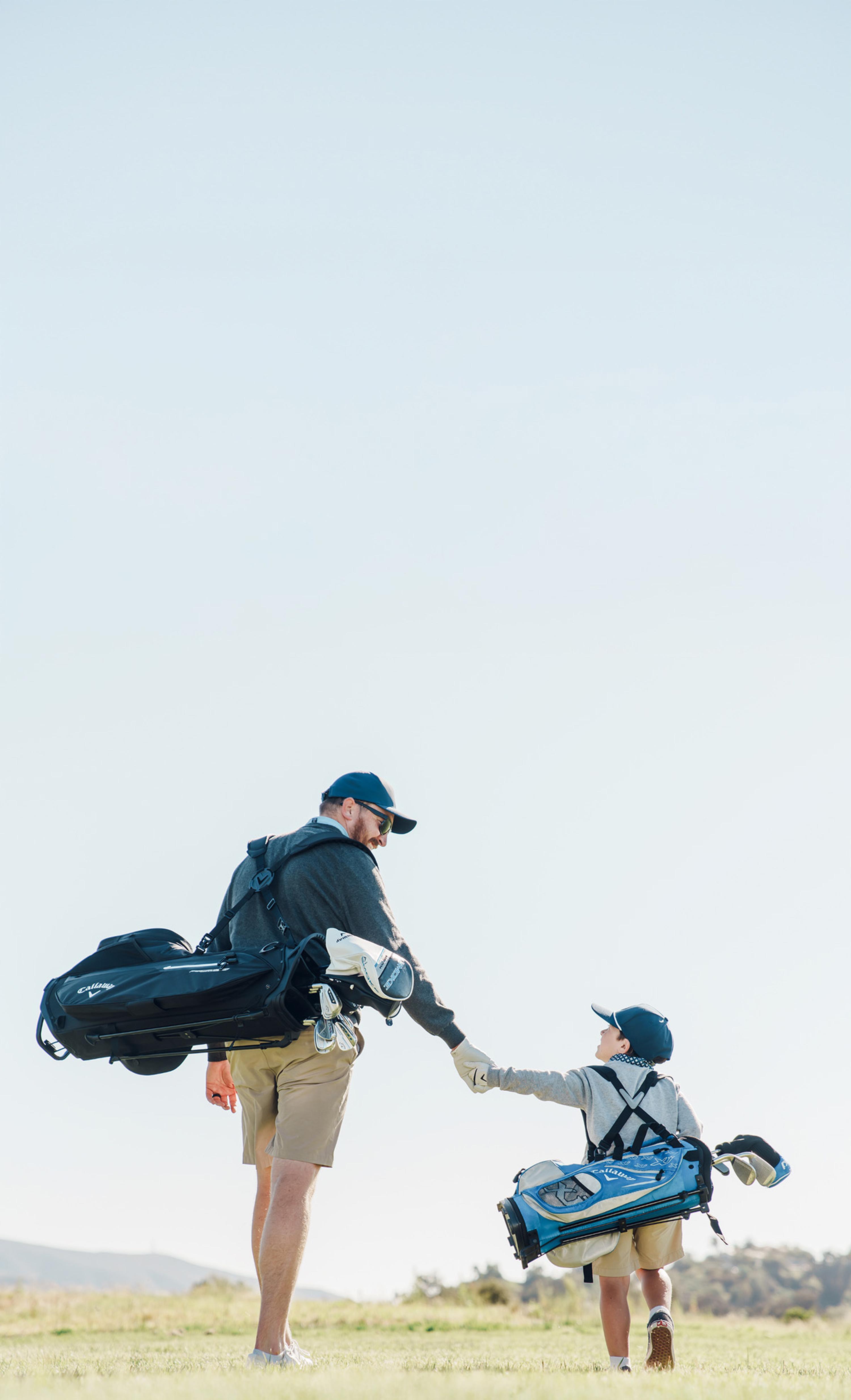 Father and son walking