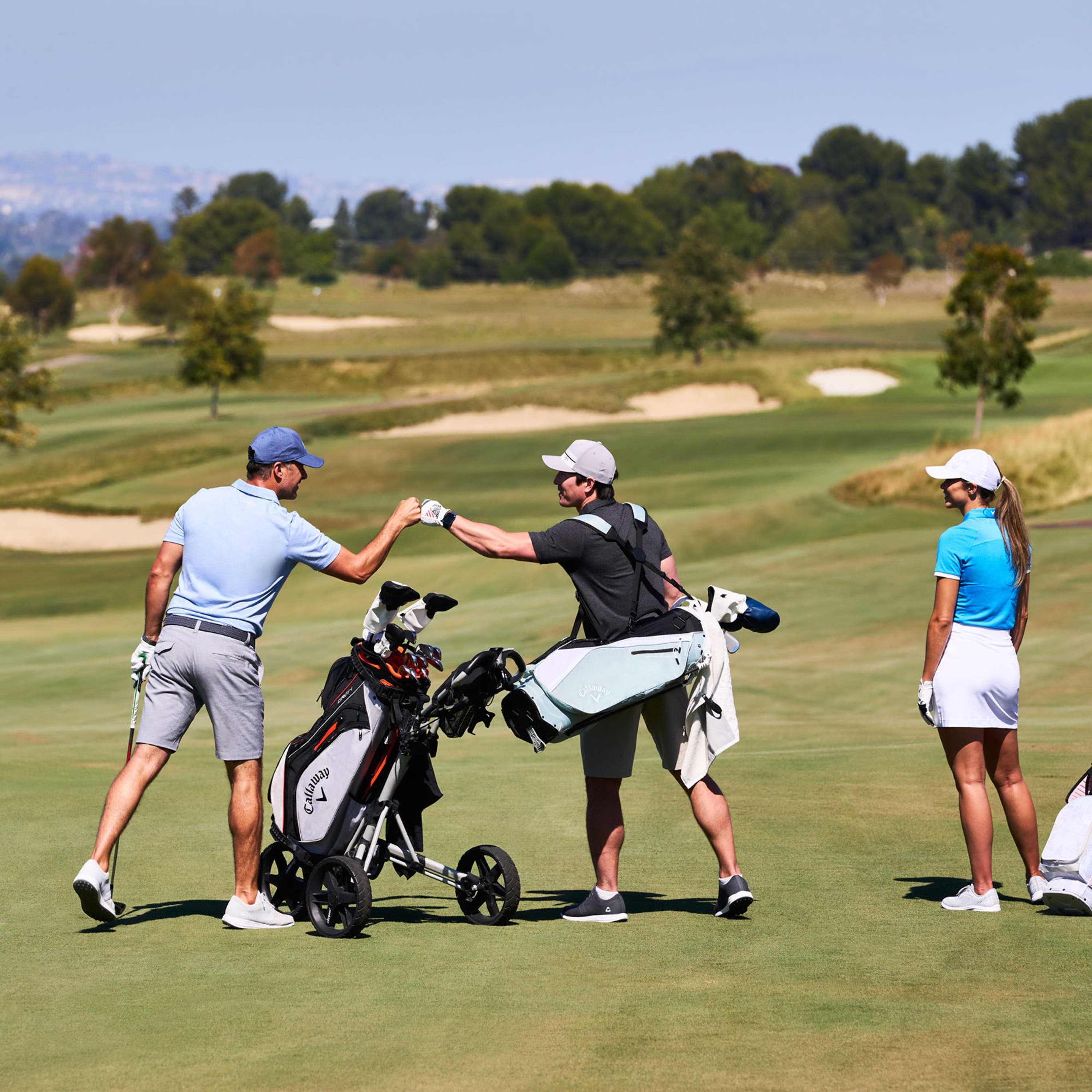 golfers playing golf