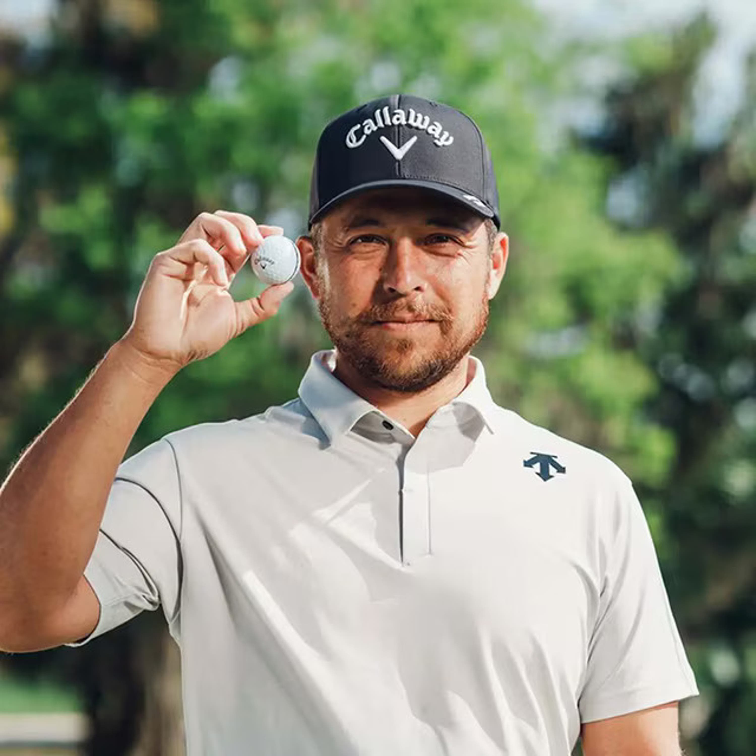 xander with his golf ball