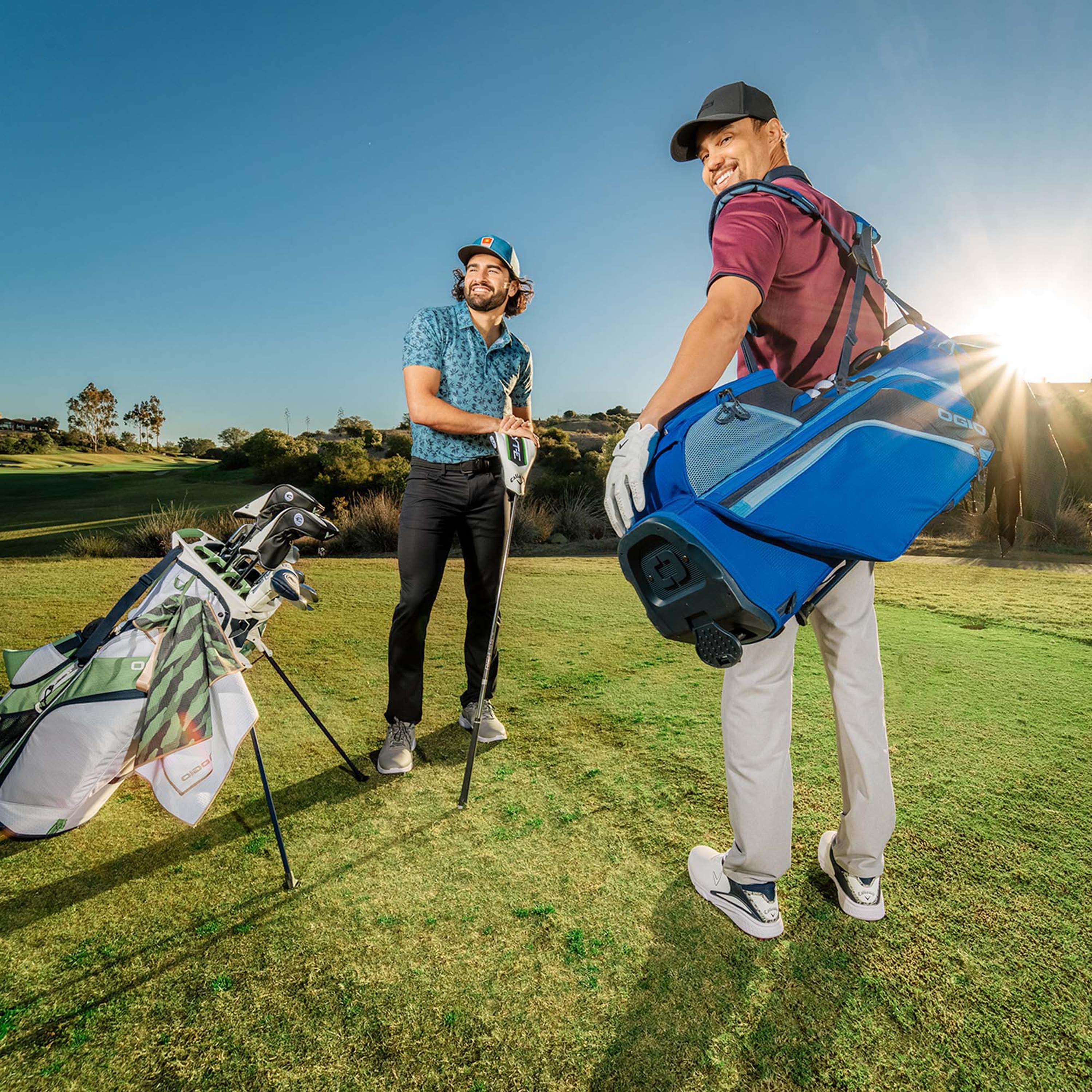 golfers showing off golf accessories