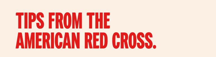 Winn-Dixie associates help the Red Cross load waters into truck