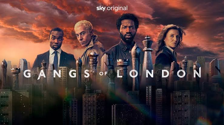 4 people standing against a skyline of London 