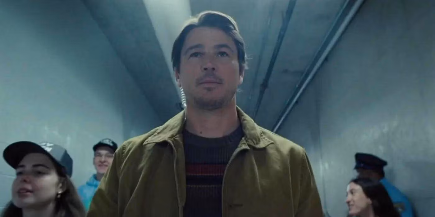 Man walking in a corridor 