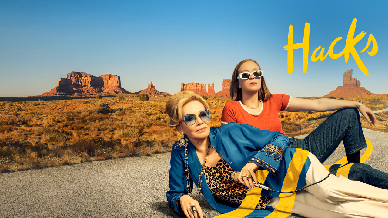 Two ladies laying on the floor 