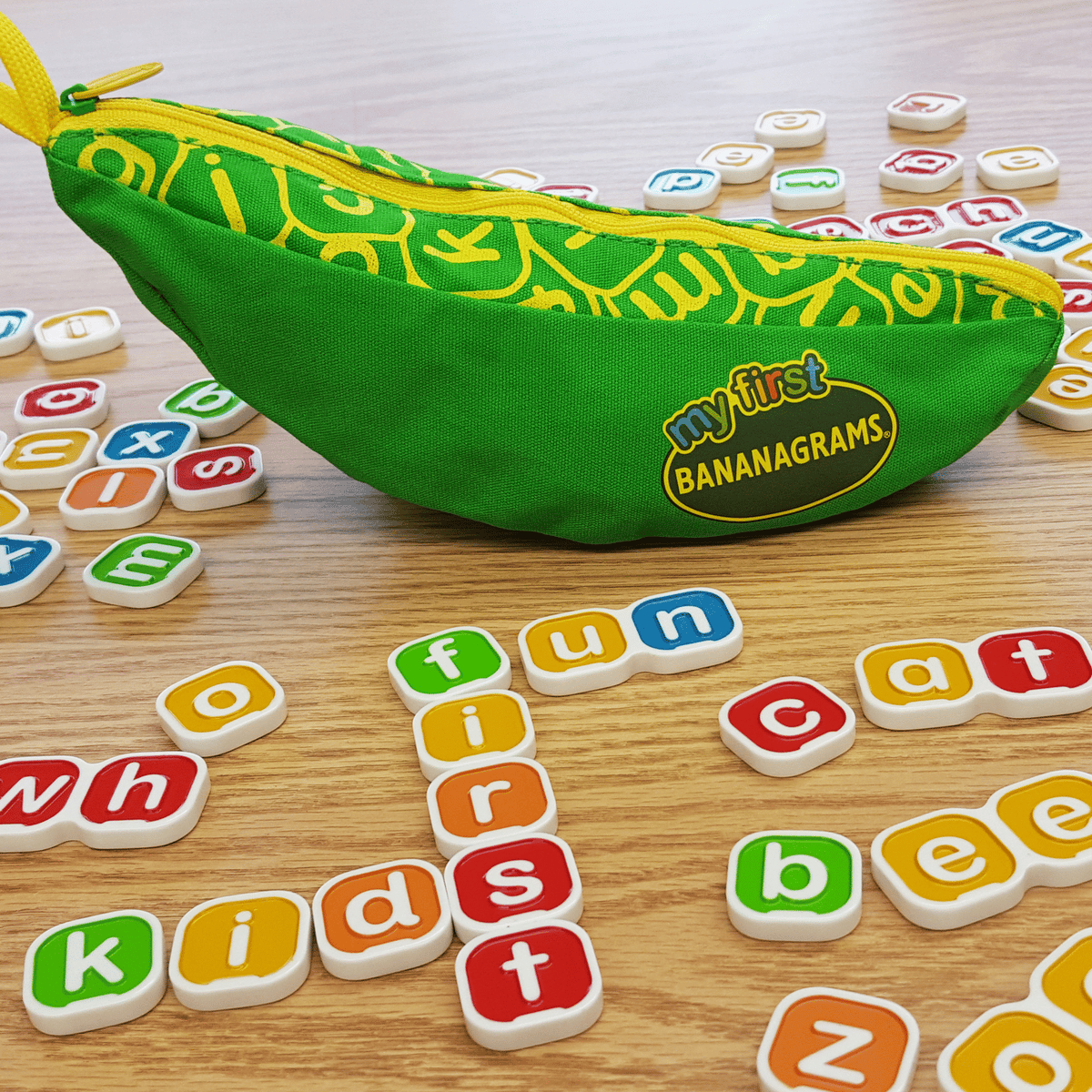 My First Bananagrams pouch surrounded by colourful lowercase letter tiles and simple words