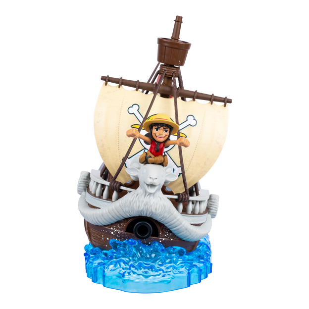 Front on view of One Piece Going Merry Deluxe Collector Ship. The front of the ship is shaped with a goats head, there is a mini action figure sitting on top of the head.