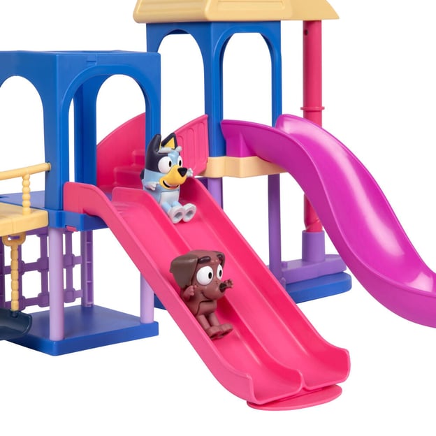 Playdate Playground Super Set with two figurines going down the slides. 
