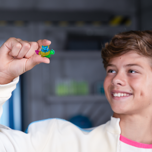Young boy holding up a Swarm.