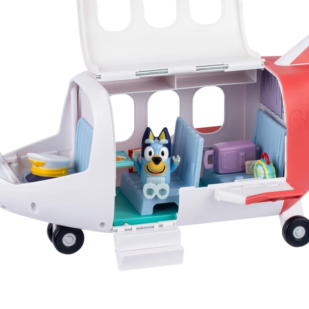 Bluey jet toy out of packaging with side panel open. 