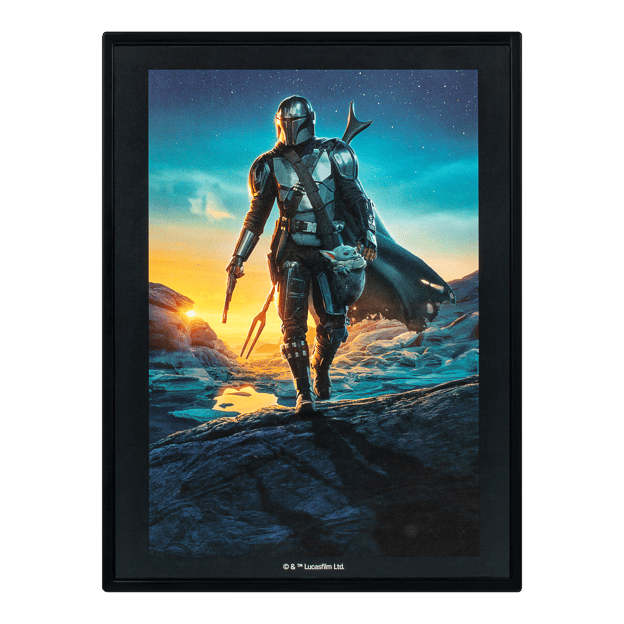 Comic book cover showing Grogu & Mando. Grogu is walking with armor in his hand and Grogu is sitting with his head pocking out of his satchel bag.