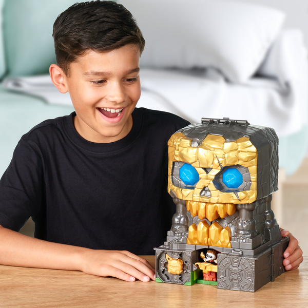 Boy looking at his Treasure X Mega Playset.