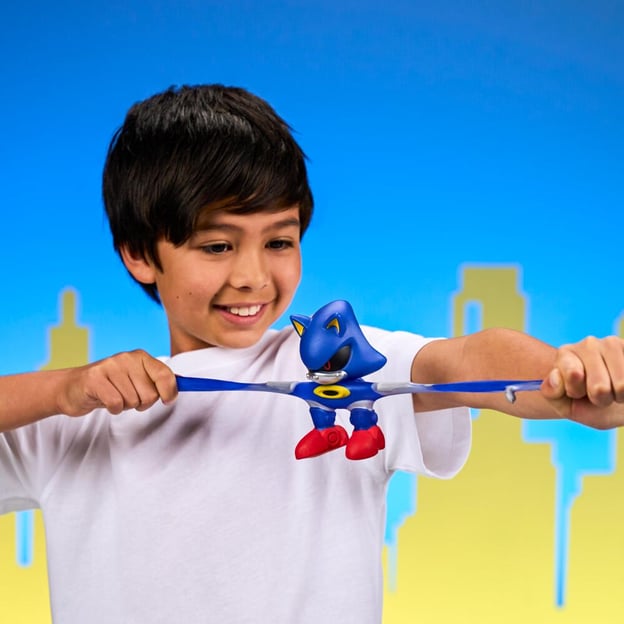 Young boy stretching a Goo Jitzu Sonic S6 Hero Pack Metal Sonic toy. 
