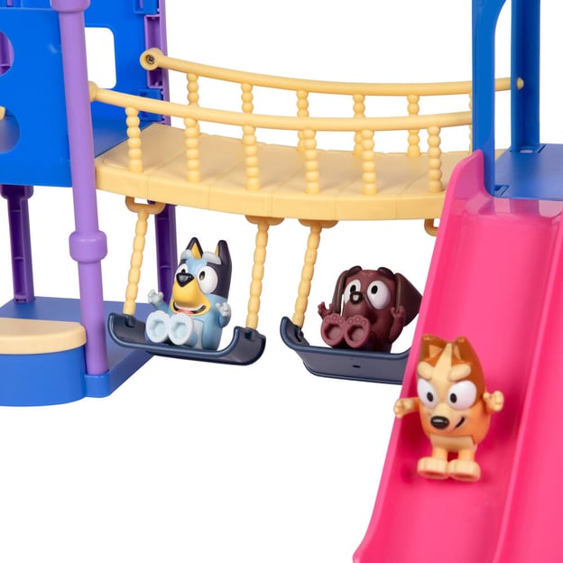 Playdate Playground Super Set with three figurines on swings and slide. 