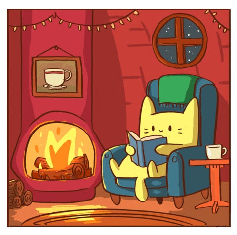 Kot siedzący przy kominku i czytający książkę.