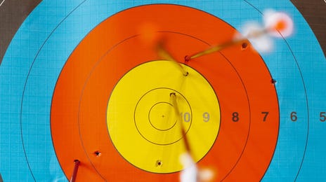 Diana con puntos marcados y flechas