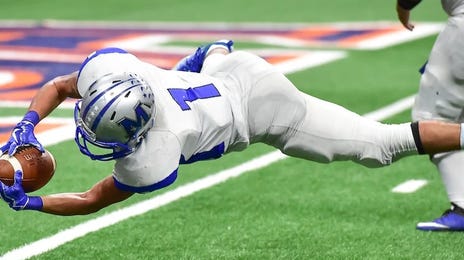 Jugador haciendo touchdown